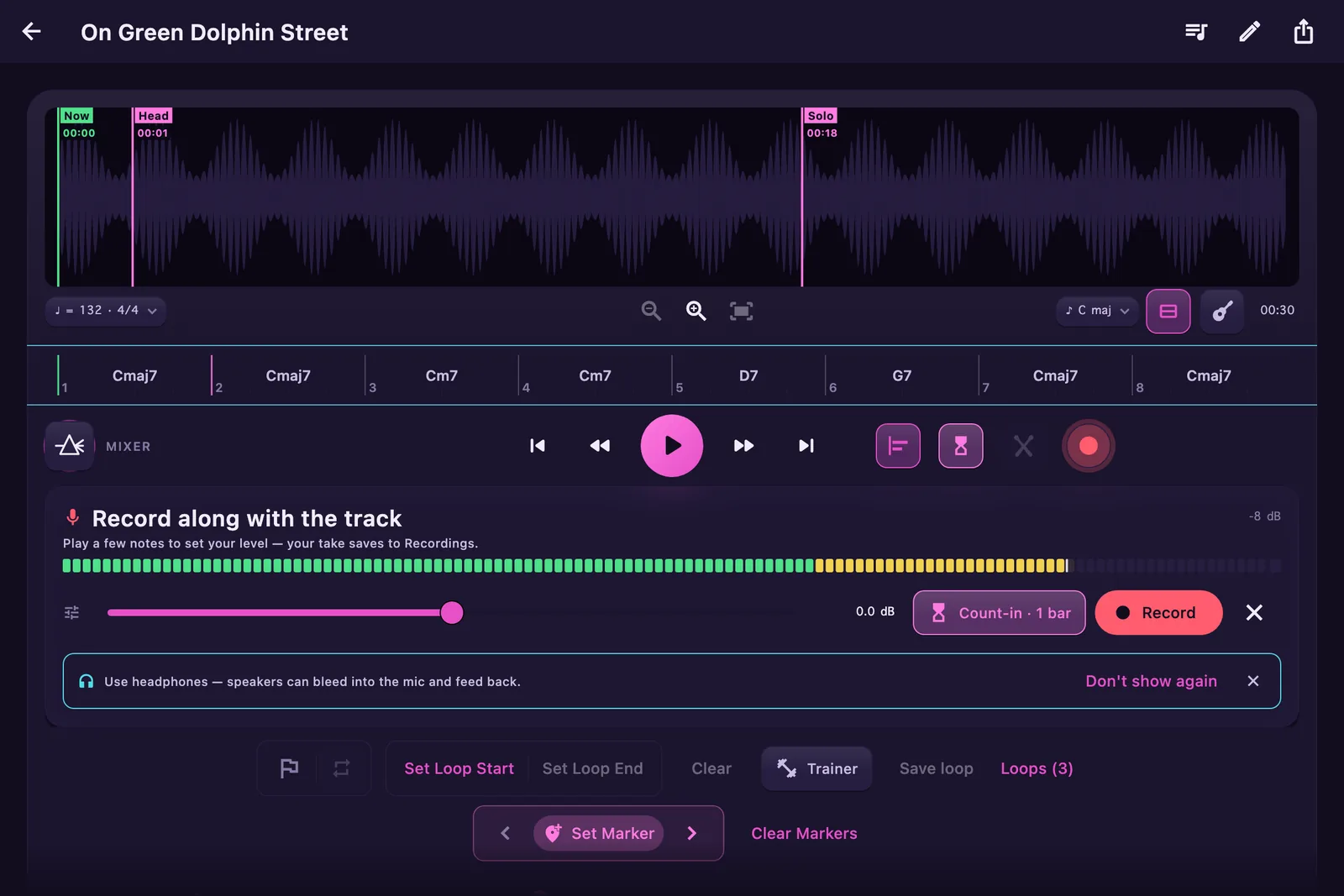 The record arm tray open on the Player: a live green level meter reading −8 dB with peak hold, the capture gain slider, a Count-in one bar chip, and the red Start button — with a use-headphones advisory beneath.