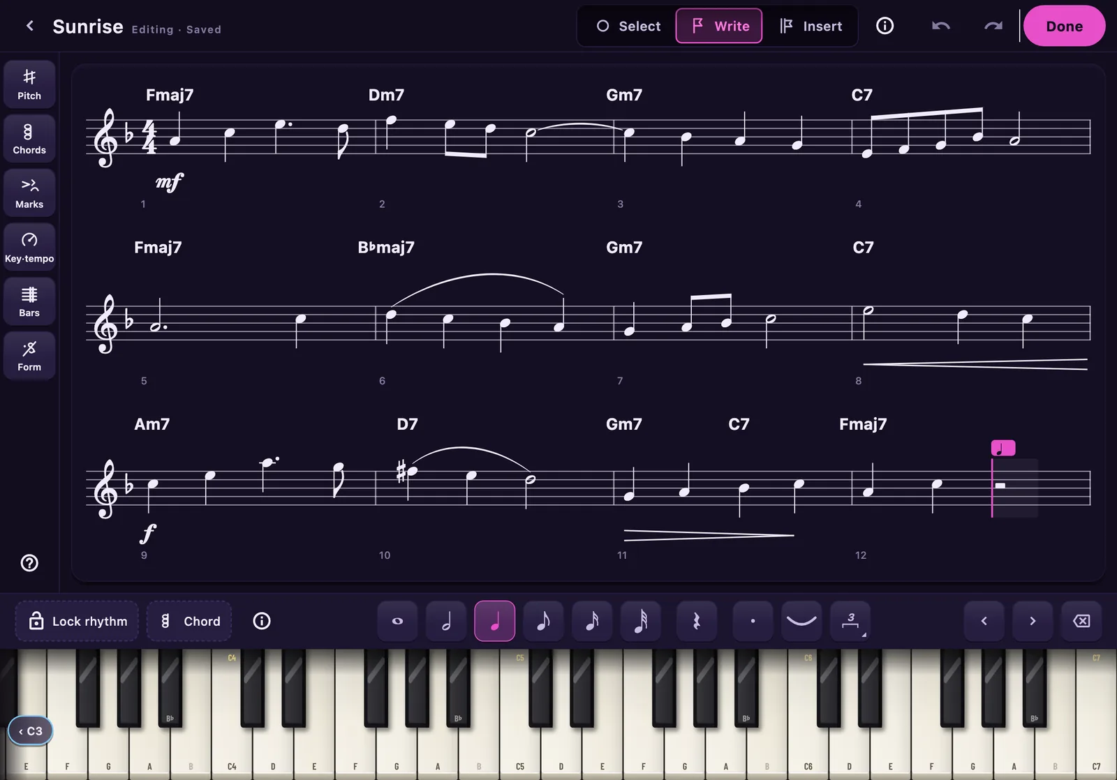The Composer mid-writing: a twelve-bar tune in F with chord symbols, slurs, a tie, dynamics and hairpins engraved on the page, the caret in Write mode on the first empty beat of the last bar, the tool rail down the left, the note values docked under the page and a piano keyboard along the bottom.